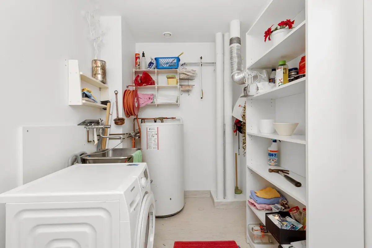 Water heater in a bright home utility room